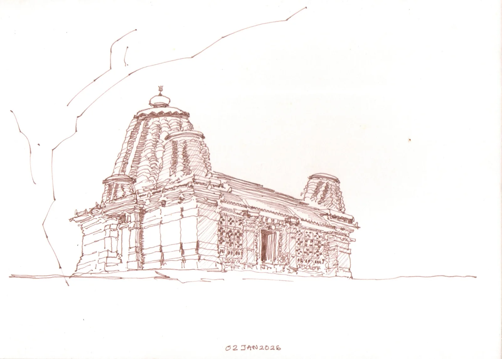 What a lovely, peaceful place. Supposedly an ancient temple. The lower level and walls are carved rock and the roof and spire are brick, which are still intact, even though a bit weathered.